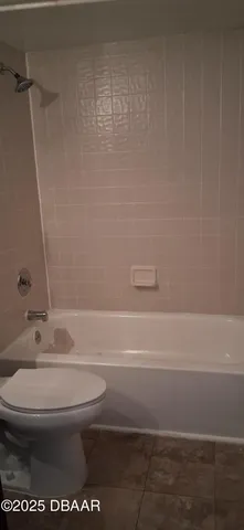 a view of floor in an empty room