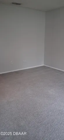 a flag is sitting in the middle of a yard