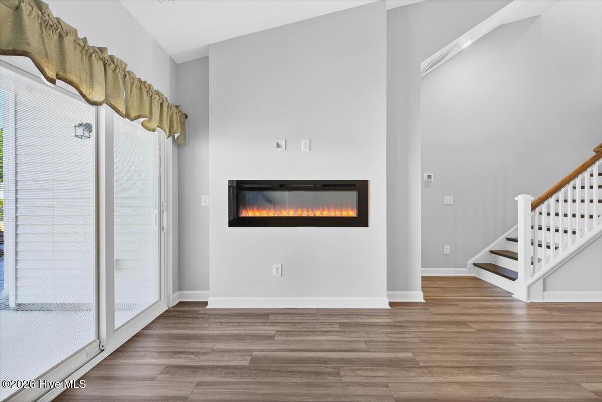 8840 Radcliff Drive Northwest Calabash, NC 28467 - Photo 17 of 54 Comfortable main living room with great flow and versatile space for seating and gathering.