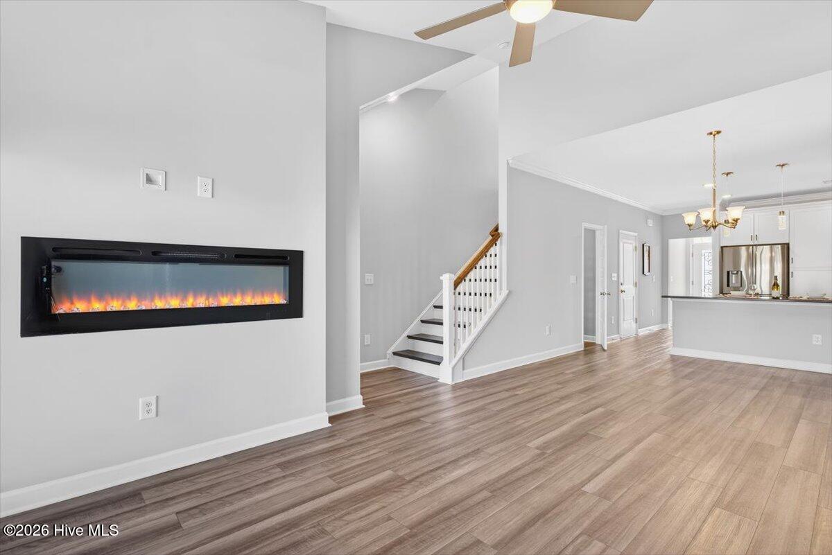 8840 Radcliff Drive Northwest Calabash, NC 28467 - Photo 18 of 54 Spacious living area featuring abundant natural light and an open layout ideal for entertaining.