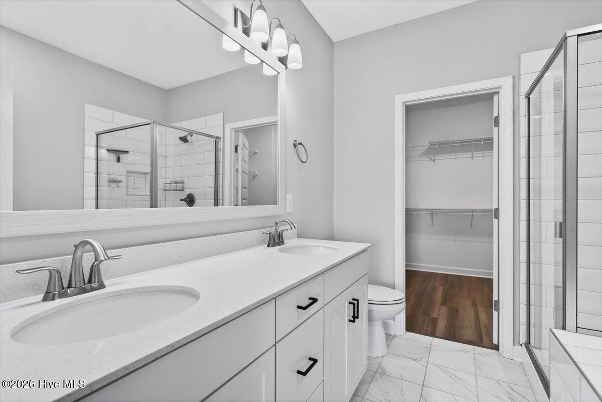 8840 Radcliff Drive Northwest Calabash, NC 28467 - Photo 24 of 54 Primary bathroom featuring clean finishes and a well-designed layout for daily comfort.