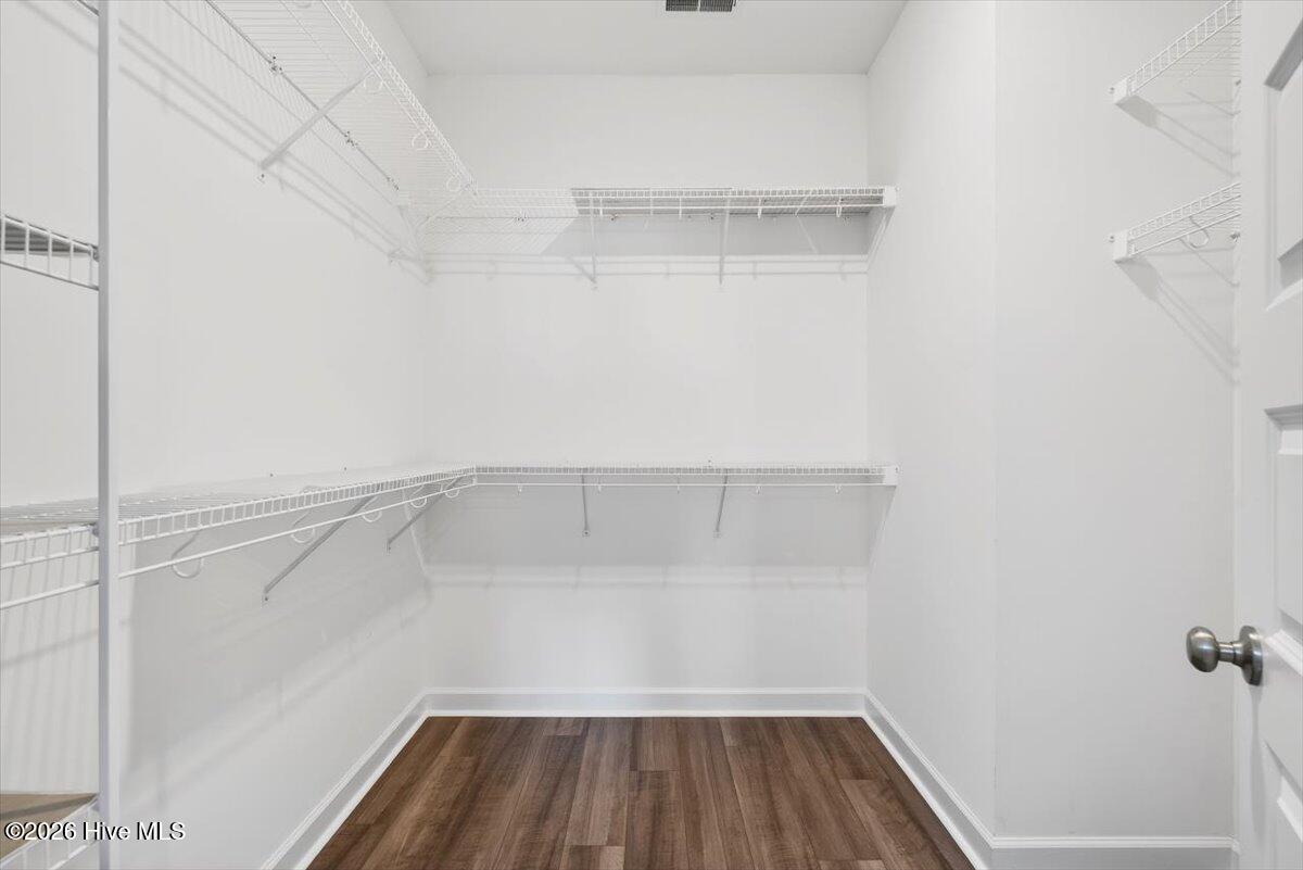 8840 Radcliff Drive Northwest Calabash, NC 28467 - Photo 25 of 54 Walk-in closet in primary bedroom.