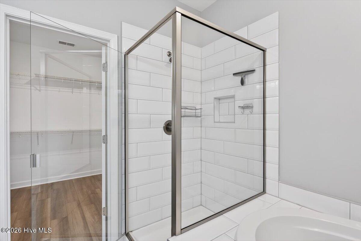 8840 Radcliff Drive Northwest Calabash, NC 28467 - Photo 26 of 54 Spacious bath area with great functionality and a comfortable flow.