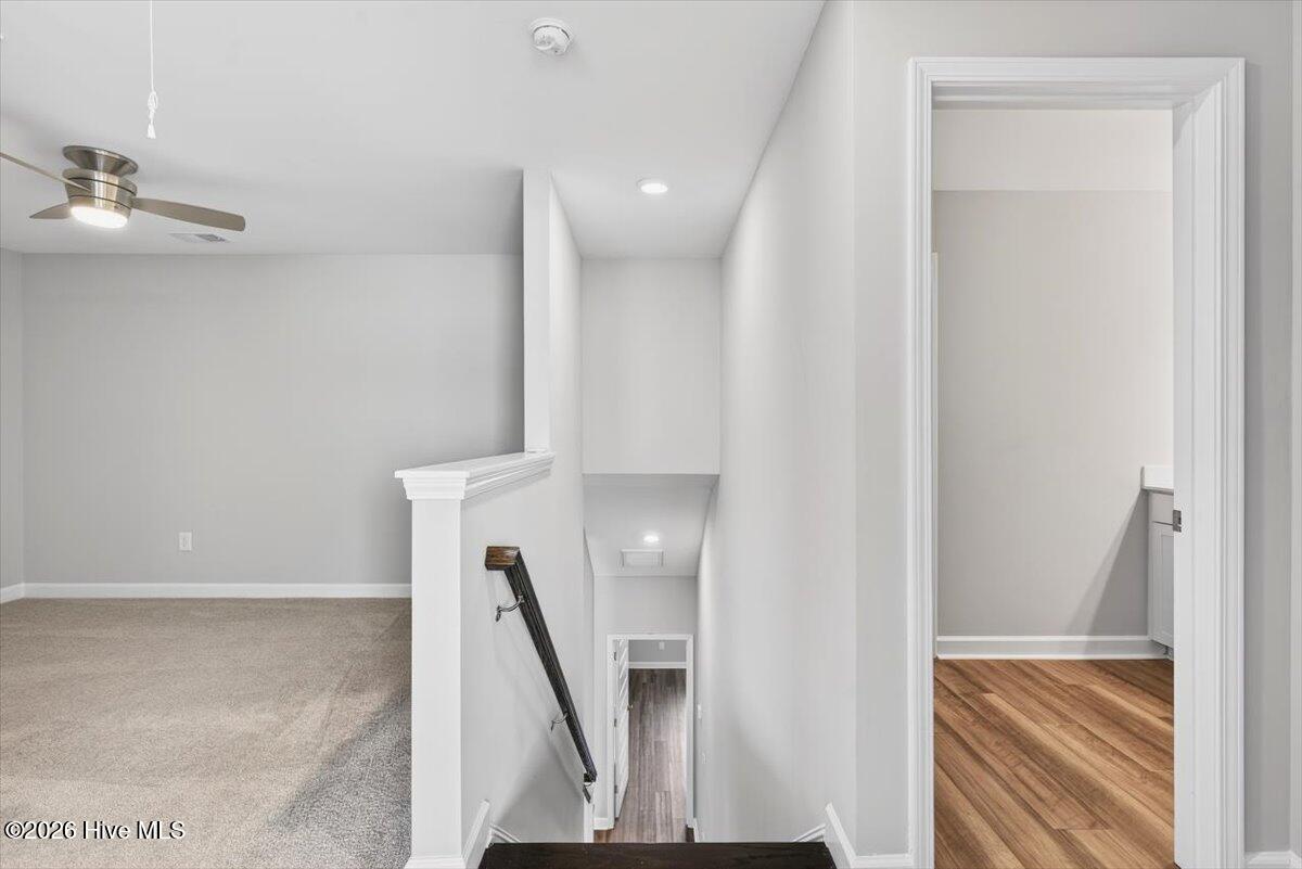 8840 Radcliff Drive Northwest Calabash, NC 28467 - Photo 32 of 54 Flexible bonus space ideal for a second living area, media room, playroom, or home office.