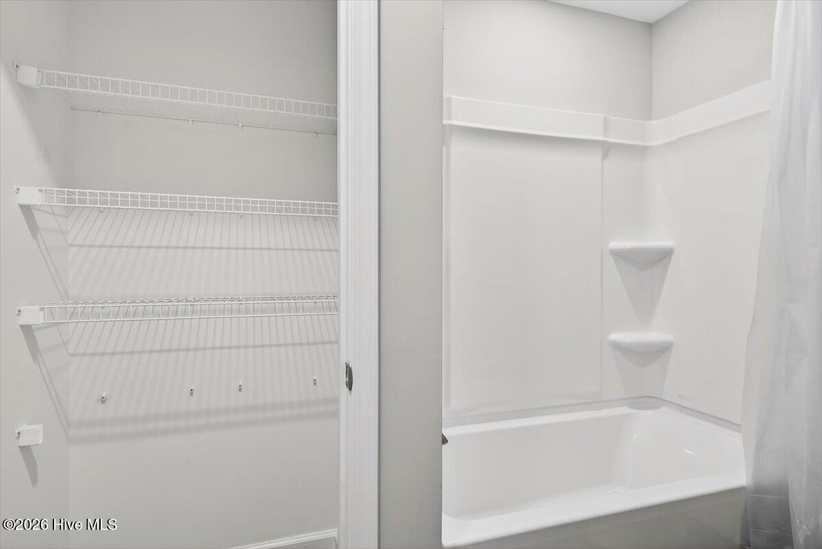 8840 Radcliff Drive Northwest Calabash, NC 28467 - Photo 41 of 54 Another angle of the bathroom showcasing space and practical design.