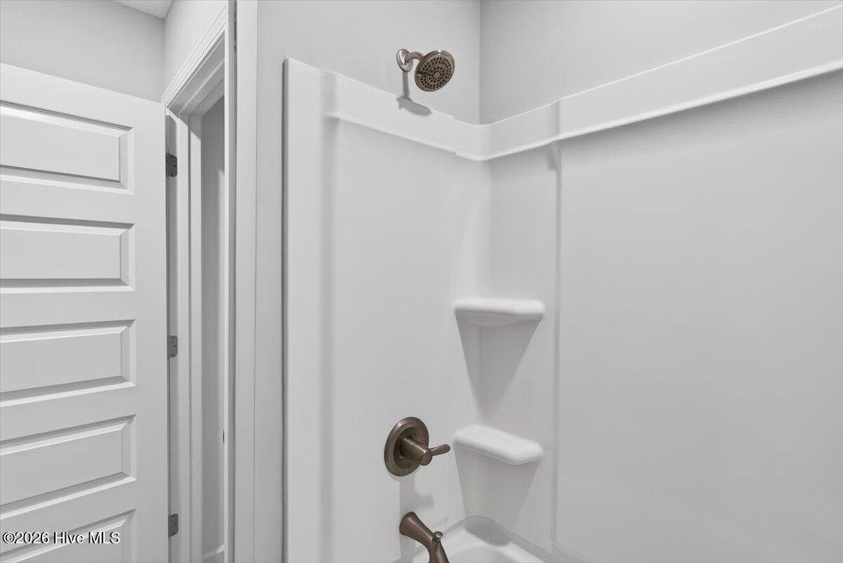 8840 Radcliff Drive Northwest Calabash, NC 28467 - Photo 42 of 54 Well-maintained bathroom with a crisp, clean aesthetic.