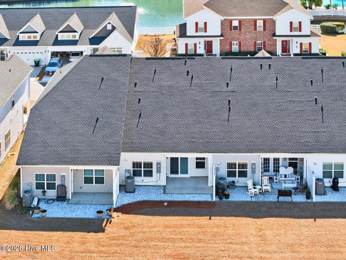8840 Radcliff Drive Northwest Calabash, NC 28467 - Photo 47 of 54 Aerial view of the townhome building.