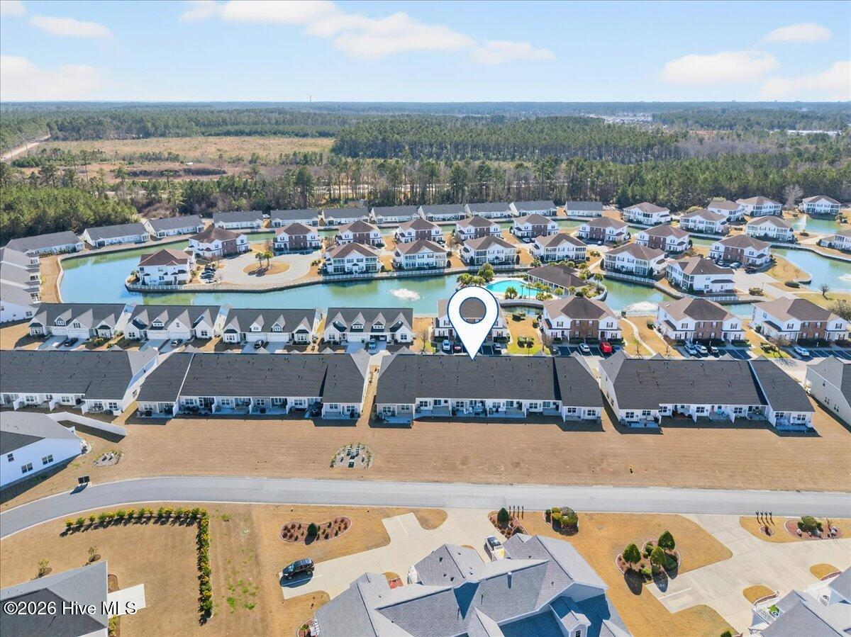 8840 Radcliff Drive Northwest Calabash, NC 28467 - Photo 49 of 54 Aerial view highlighting the back of the property in proximity to its surroundings.