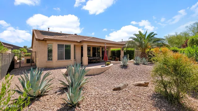 a view of a house with patio outdoor seating