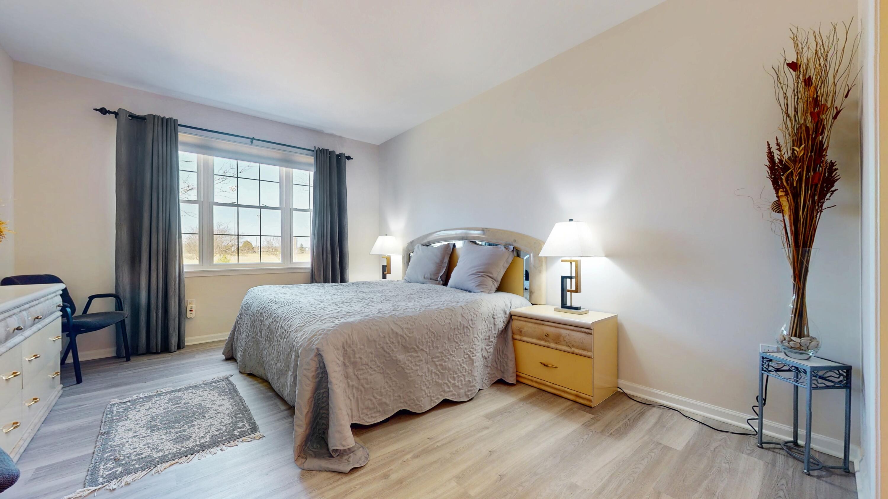 1151 East Townline Road, Unit 102 Lake Geneva, WI 53147 - Photo 7 of 15 Master Suite