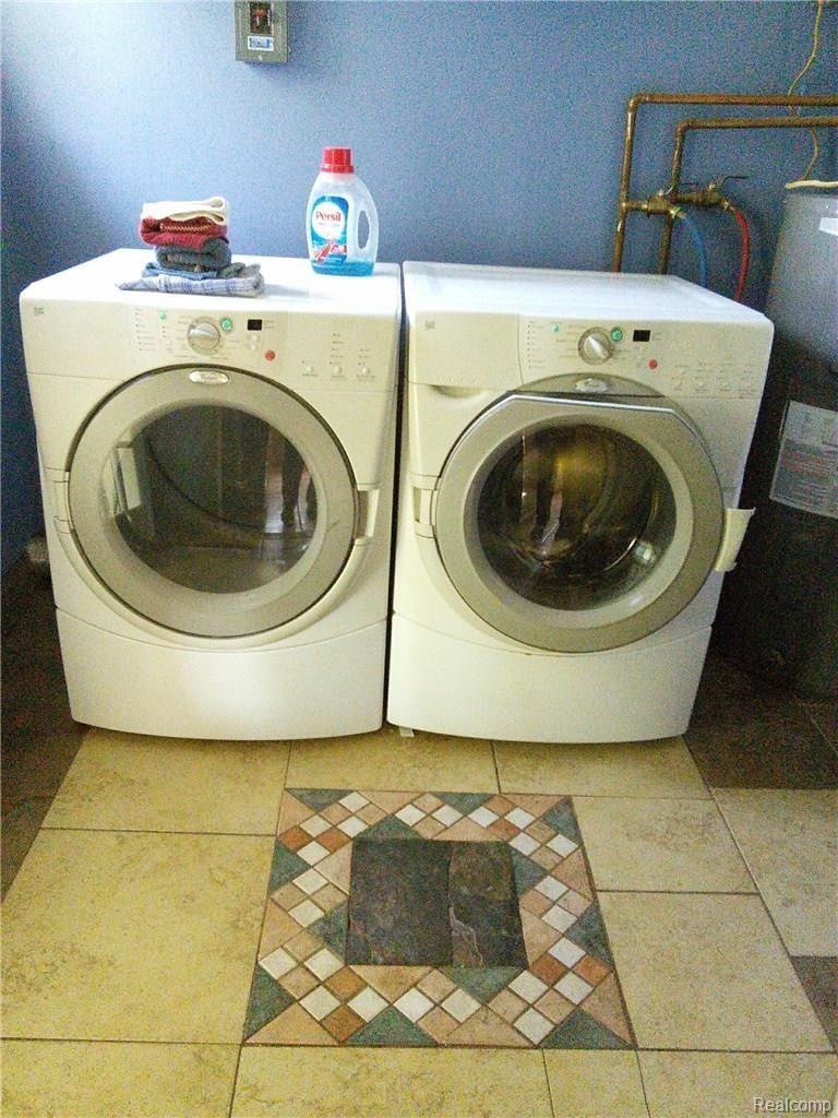 4400 Van Slyke Road Flint, MI 48507 - Photo 18 of 26 Whirlpool front loader W & D stays!