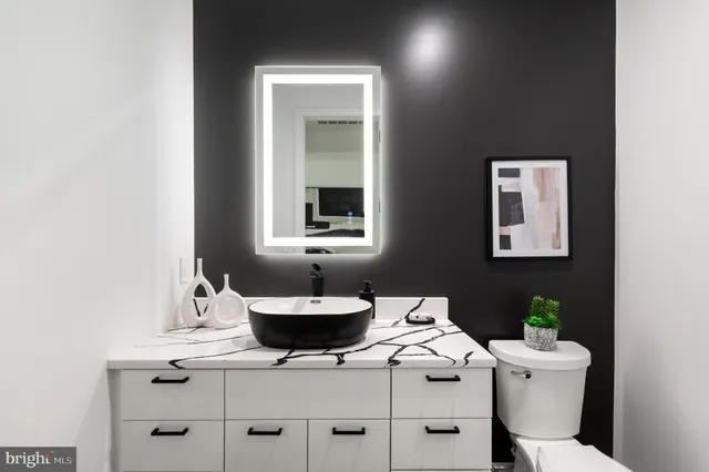 a bathroom with a sink and a toilet