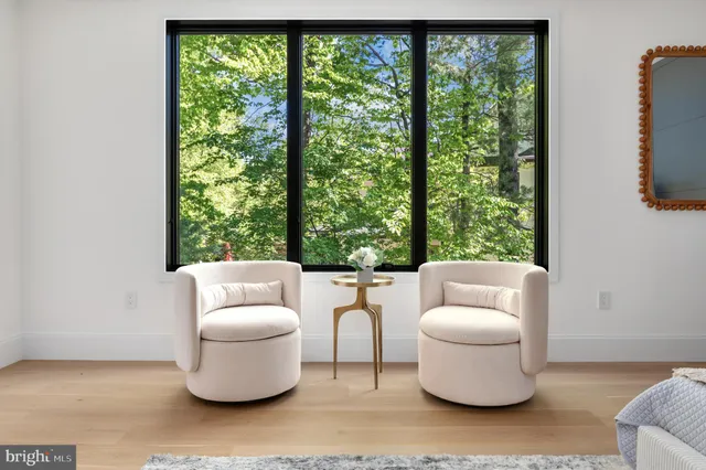 a spacious bathroom with a double vanity sink a mirror and a bathtub