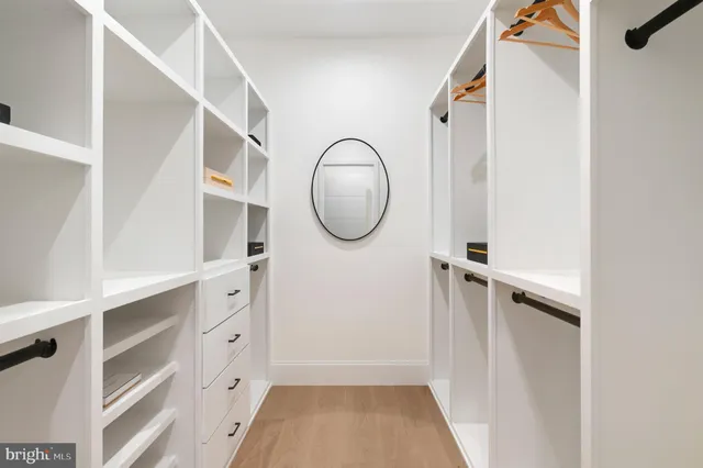 wooden floor with white walls