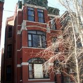a kitchen with counter top space a sink appliances and cabinets