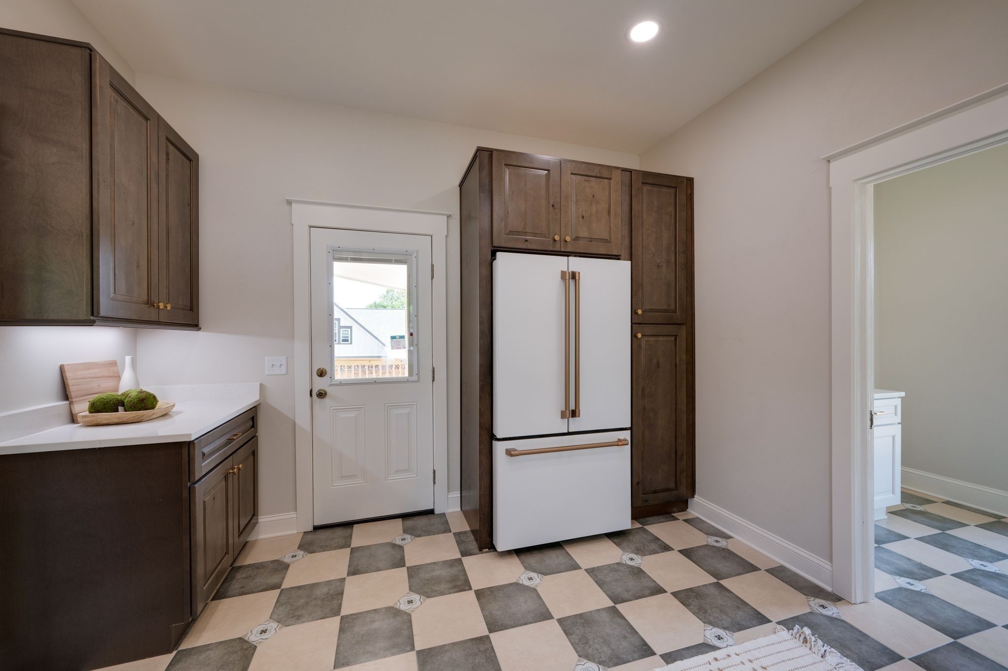 414 West College Street Dickson, TN 37055 - Photo 12 of 53 a kitchen with a refrigerator and a sink