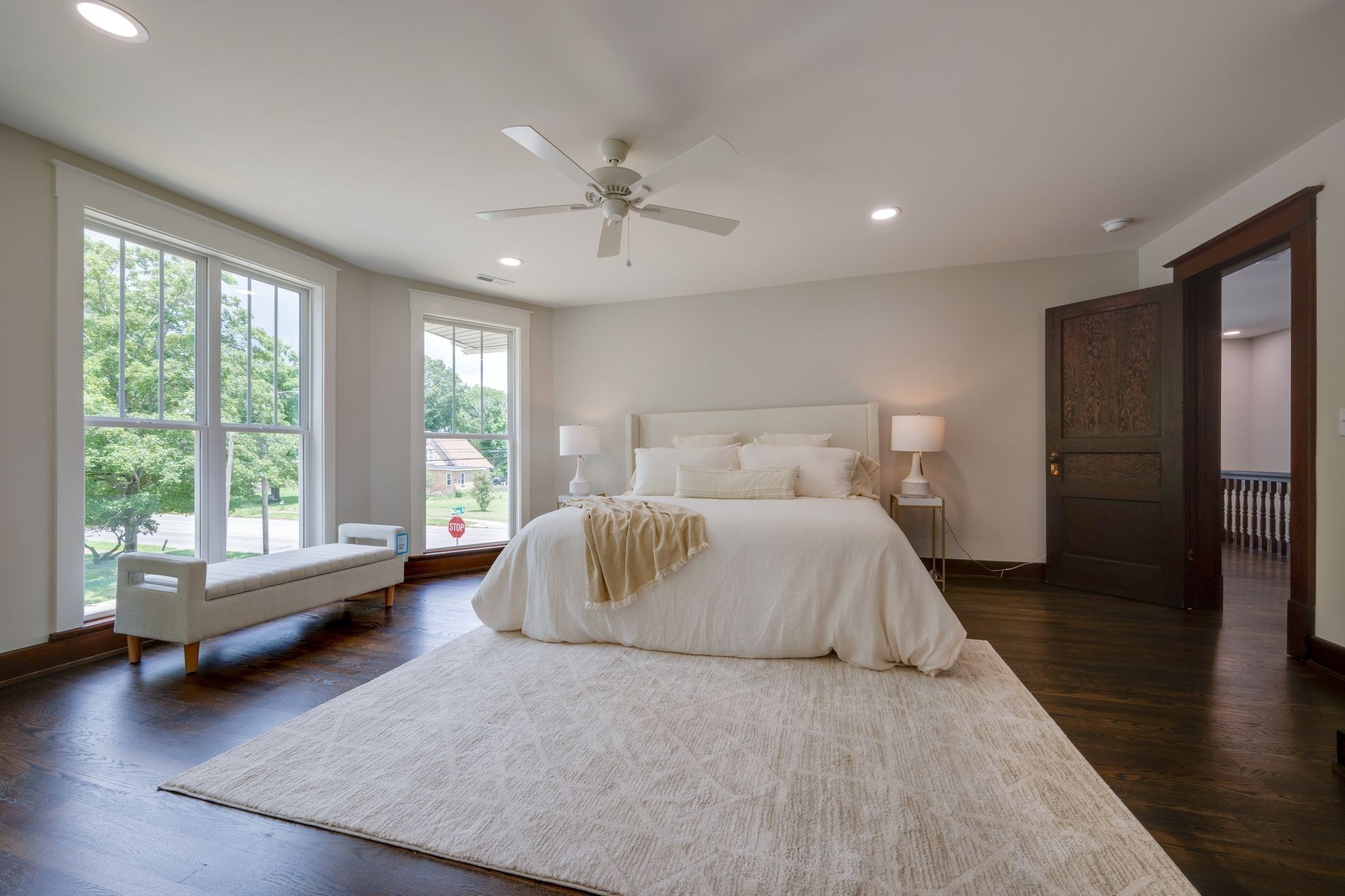 414 West College Street Dickson, TN 37055 - Photo 19 of 53 a bedroom with a bed and wooden floor