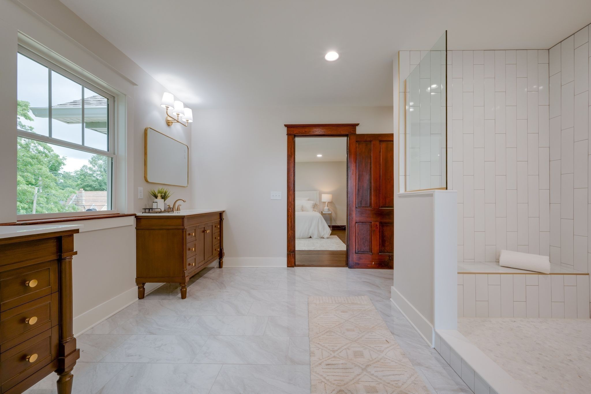 414 West College Street Dickson, TN 37055 - Photo 24 of 53 a view of a room with cabinet mirror and windows