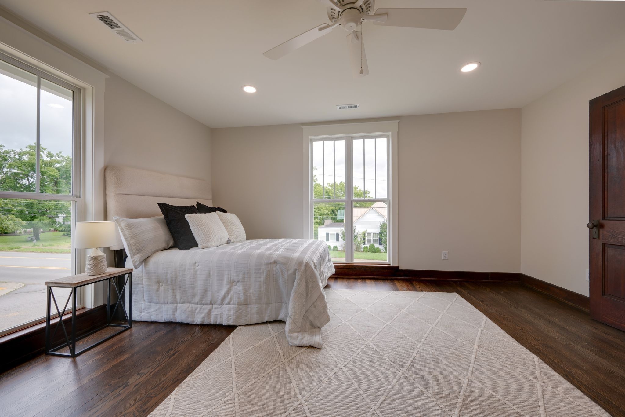 414 West College Street Dickson, TN 37055 - Photo 26 of 53 a spacious bedroom with a bed and a window