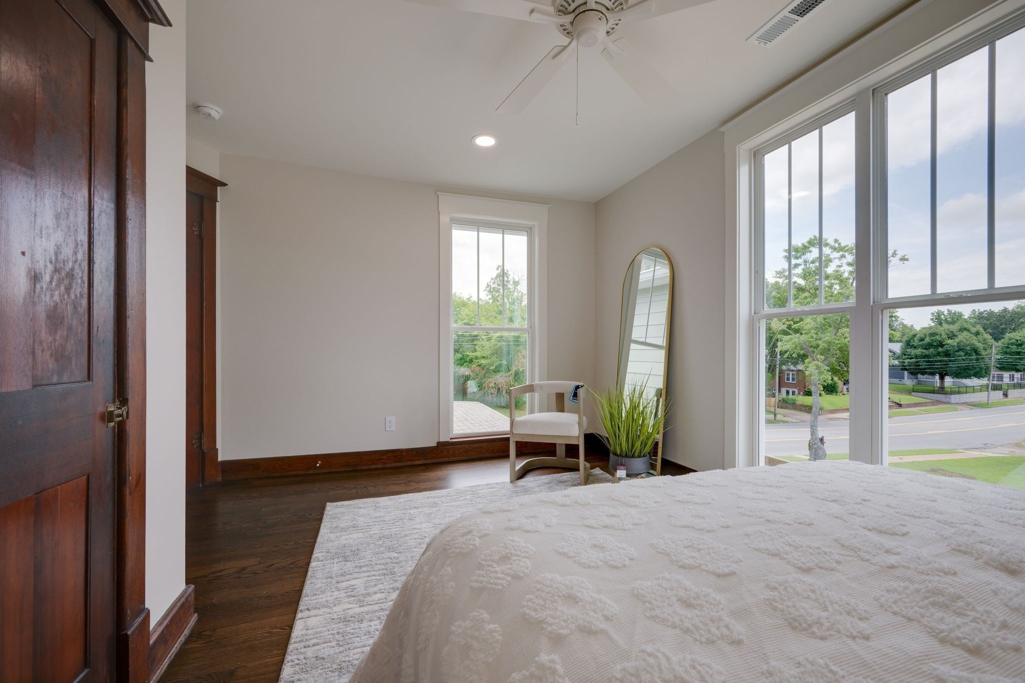 414 West College Street Dickson, TN 37055 - Photo 31 of 53 a living room with a bed furniture and a large window