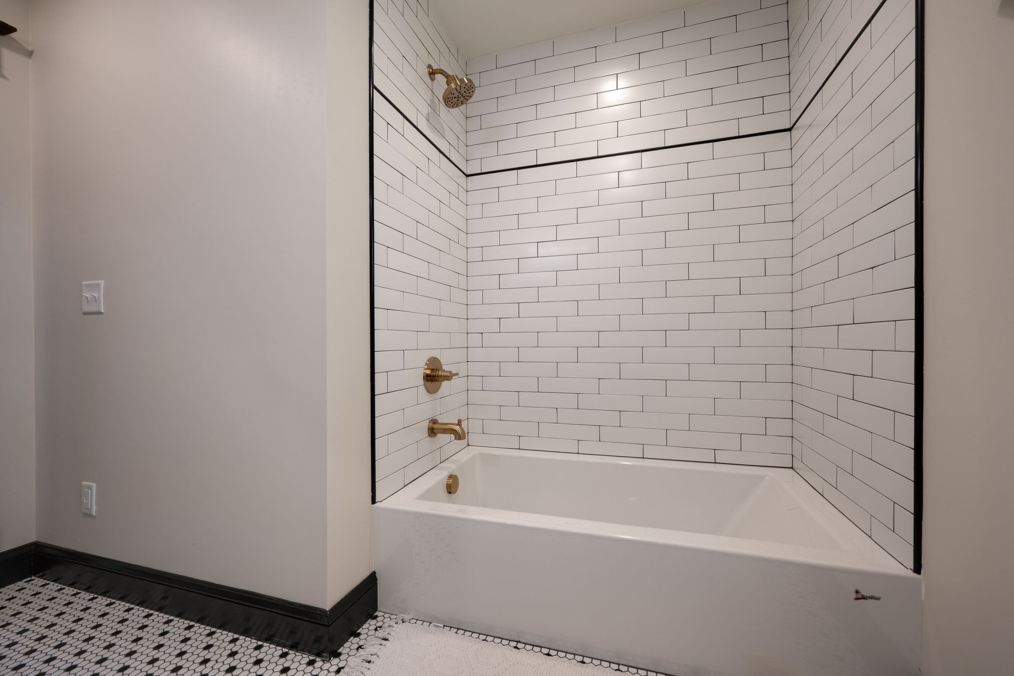 414 West College Street Dickson, TN 37055 - Photo 33 of 53 a bathroom with a bathtub