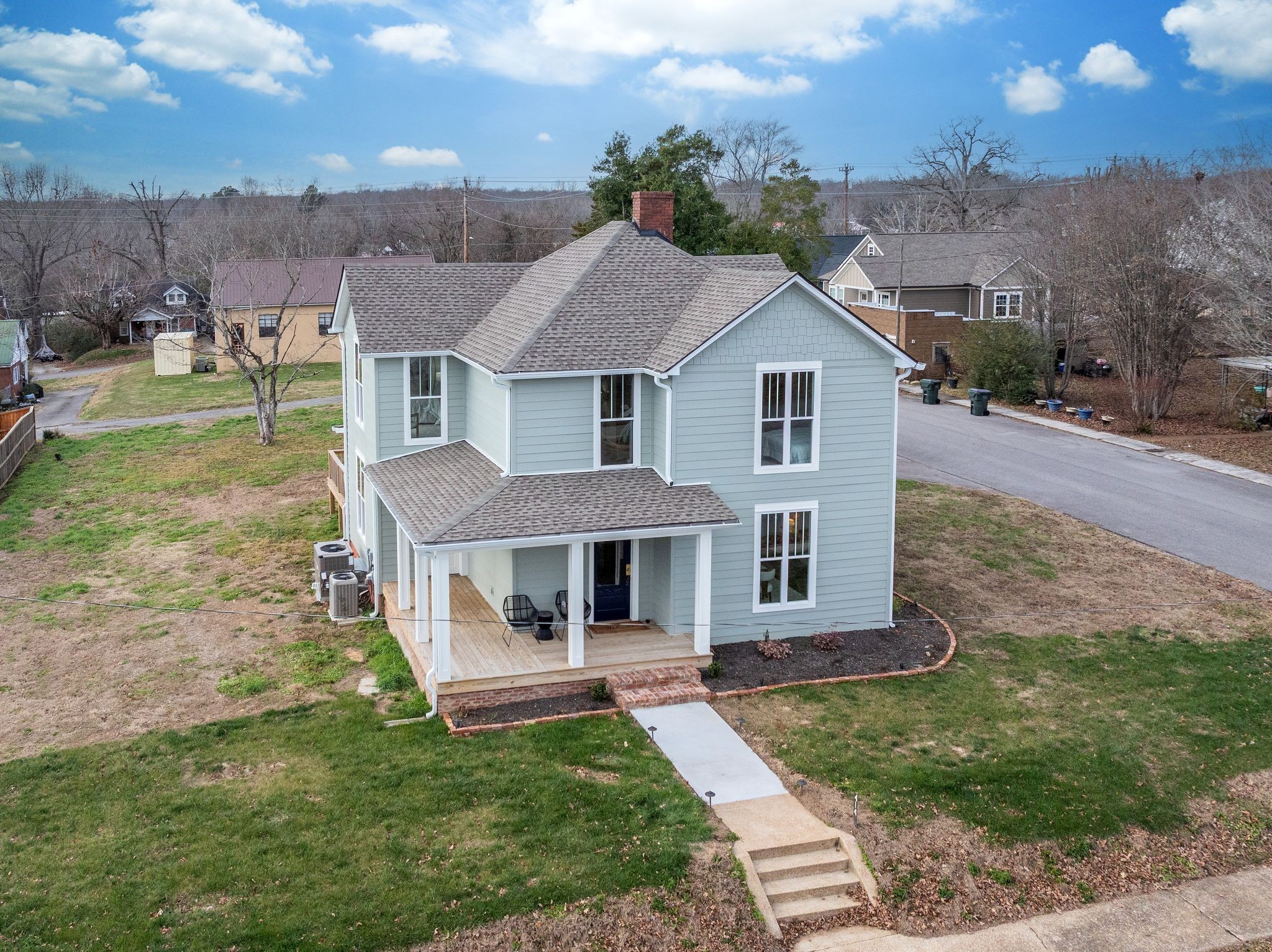 414 West College Street Dickson, TN 37055 - Photo 40 of 53 a front view of a house with a yard