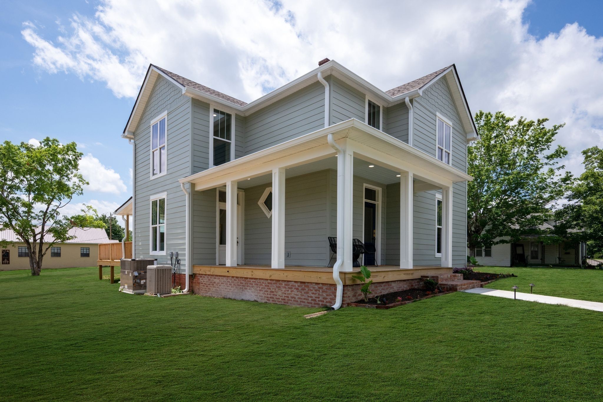 414 West College Street Dickson, TN 37055 - Photo 41 of 53 a view of a house with a yard