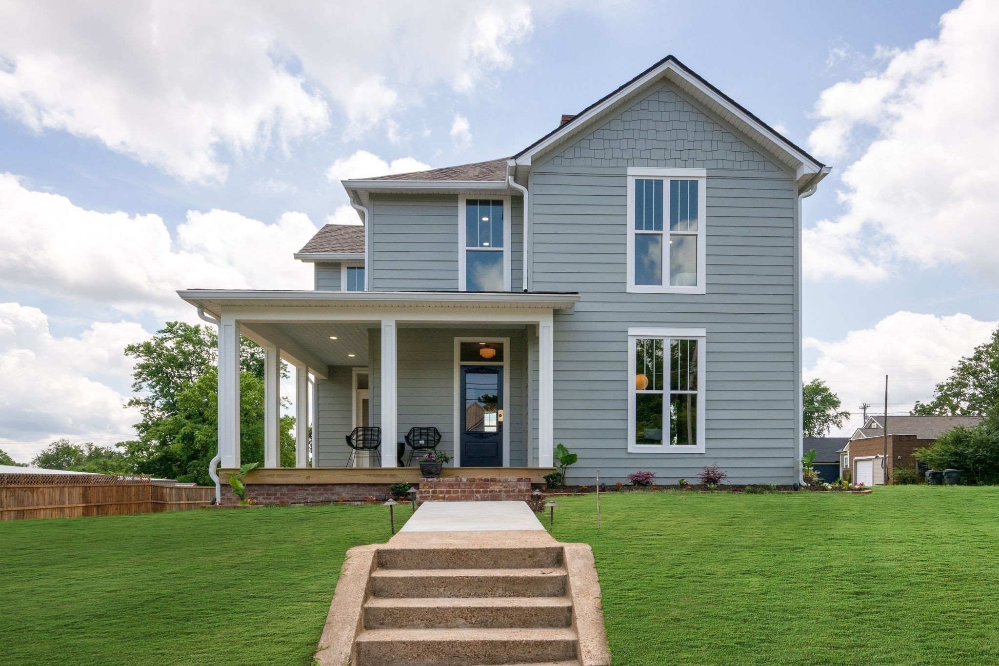 414 West College Street Dickson, TN 37055 - Photo 43 of 53 a front view of a house with a yard