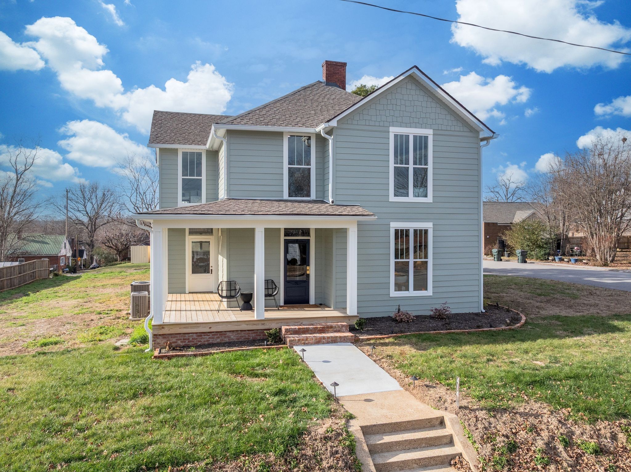 414 West College Street Dickson, TN 37055 - Photo 53 of 53 a front view of a house with garden