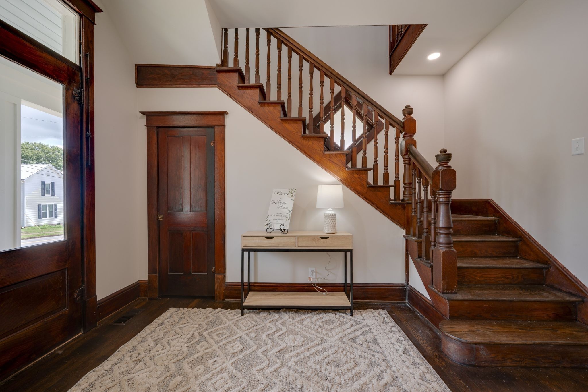 414 West College Street Dickson, TN 37055 - Photo 9 of 53 a view of entryway and hall with wooden floor