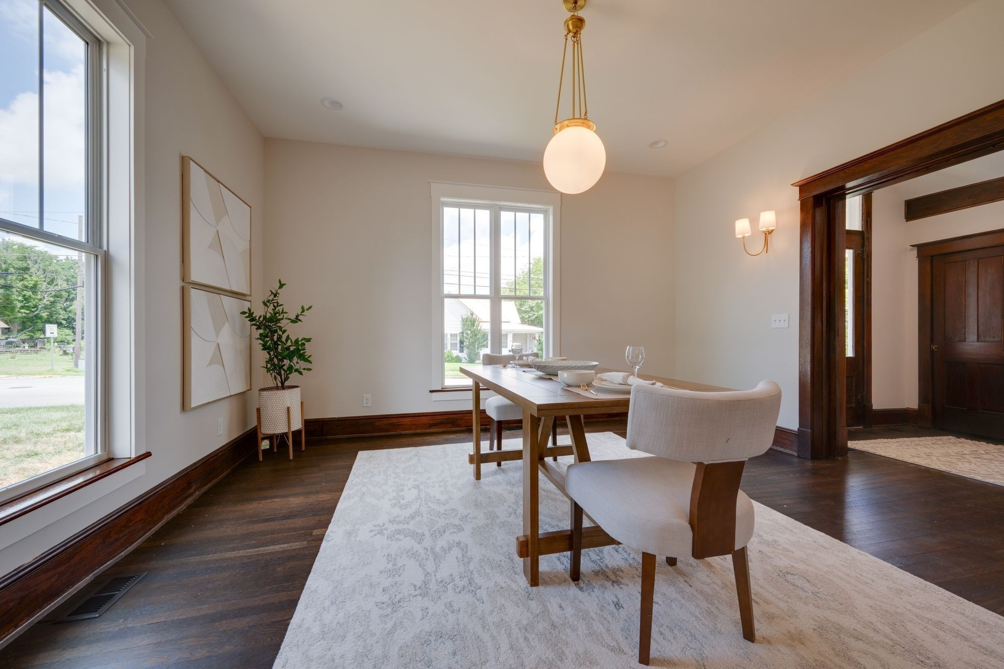 414 West College Street Dickson, TN 37055 - Photo 10 of 53 a view of a dining room with furniture and wooden floor