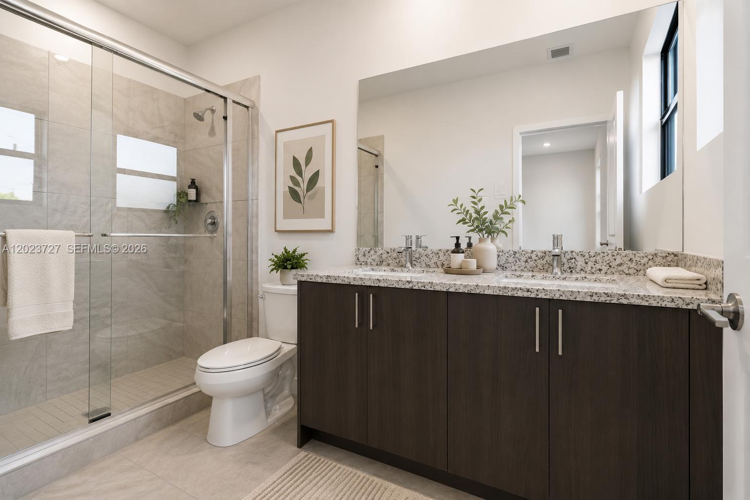 22348 Southwest 115th Court, Unit 22348 Miami, FL 33170 - Photo 22 of 37 a bathroom with a sink toilet and shower