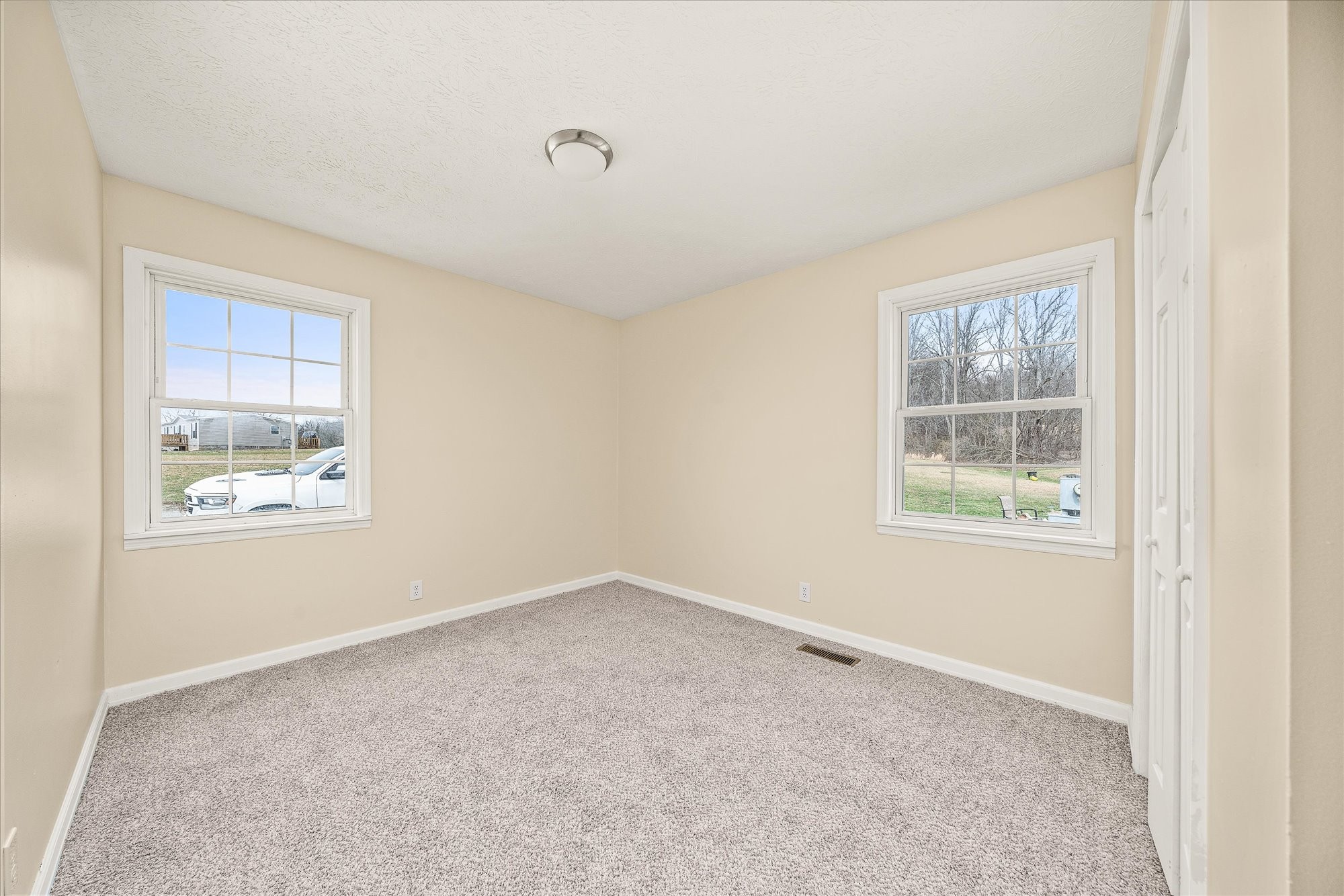11216 Clay County Highway Moss, TN 38575 - Photo 13 of 40 an empty room with windows