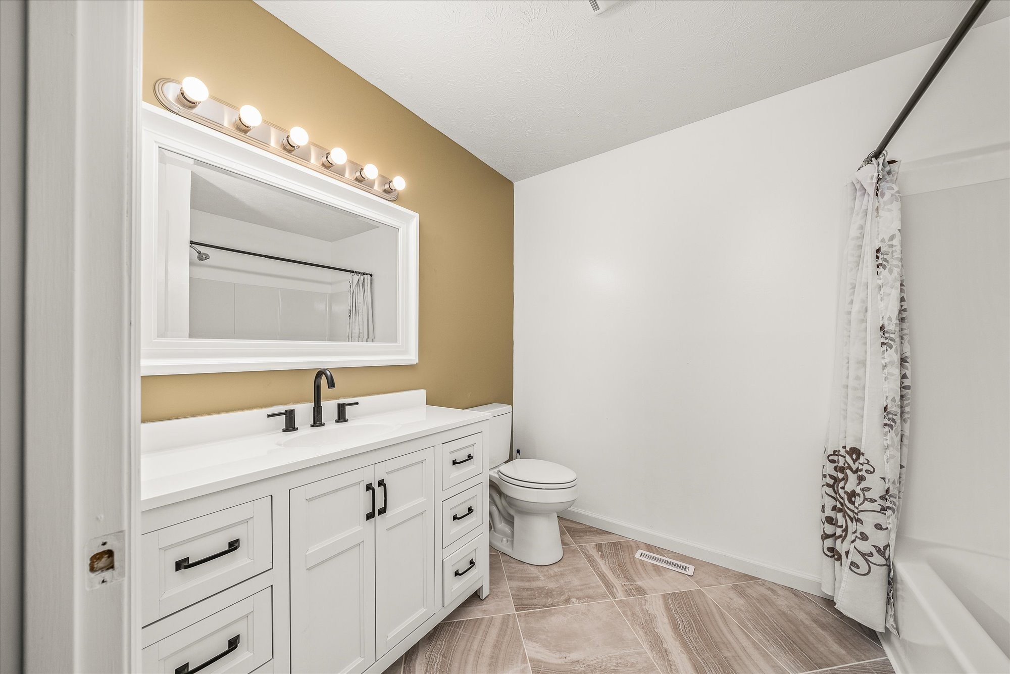 11216 Clay County Highway Moss, TN 38575 - Photo 16 of 40 a bathroom with a double vanity sink mirror and toilet