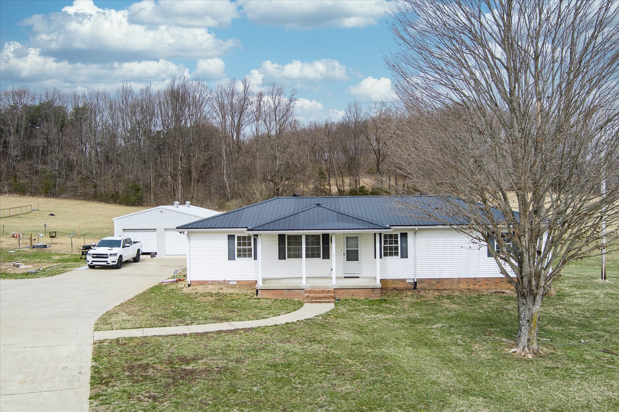 11216 Clay County Highway Moss, TN 38575 - Photo 25 of 40 a house with trees in the background