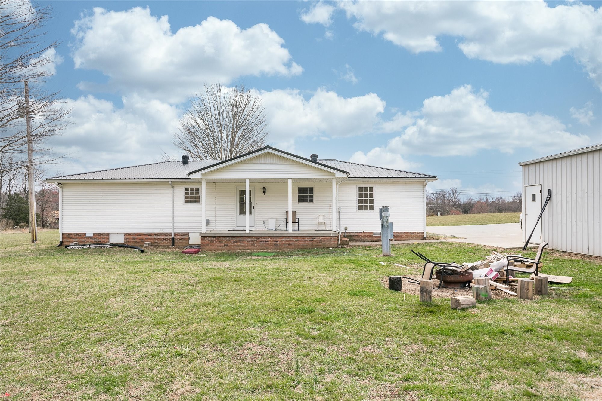 11216 Clay County Highway Moss, TN 38575 - Photo 35 of 40 a view of a house with swimming pool and sitting area
