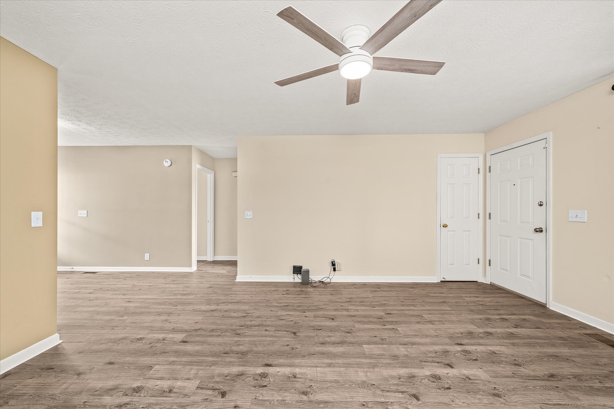 11216 Clay County Highway Moss, TN 38575 - Photo 8 of 40 an empty room with wooden floor and windows