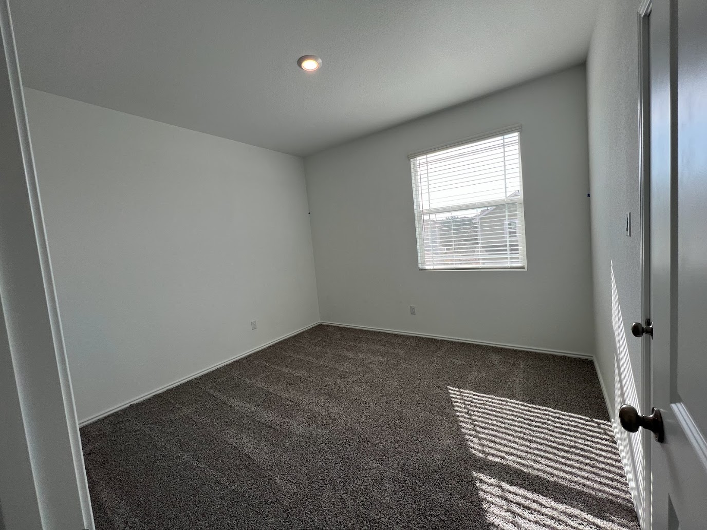 313 Montauk Loop Georgetown, TX 78628 - Photo 10 of 25 an empty room with a window