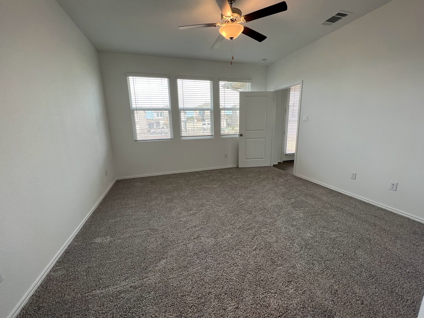 313 Montauk Loop Georgetown, TX 78628 - Photo 23 of 25 an empty room with a window