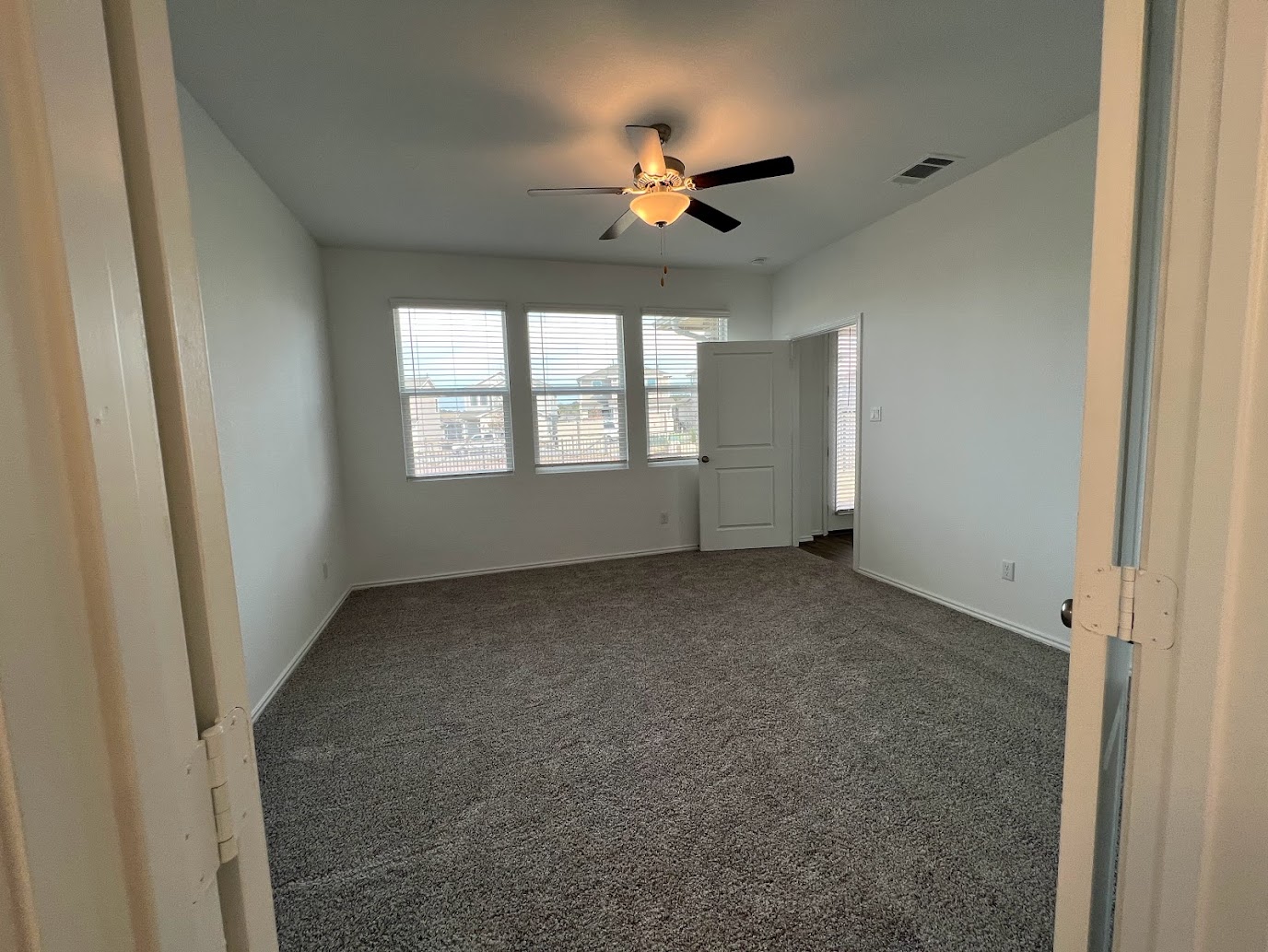 313 Montauk Loop Georgetown, TX 78628 - Photo 4 of 25 a view of an empty room with a window