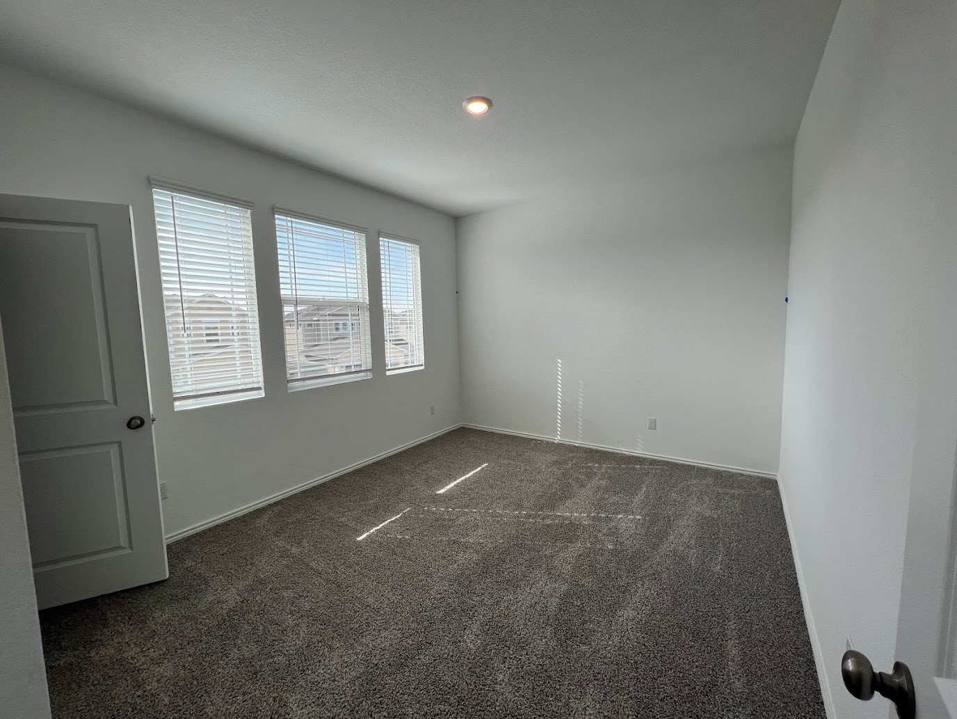 313 Montauk Loop Georgetown, TX 78628 - Photo 6 of 25 an empty room with windows