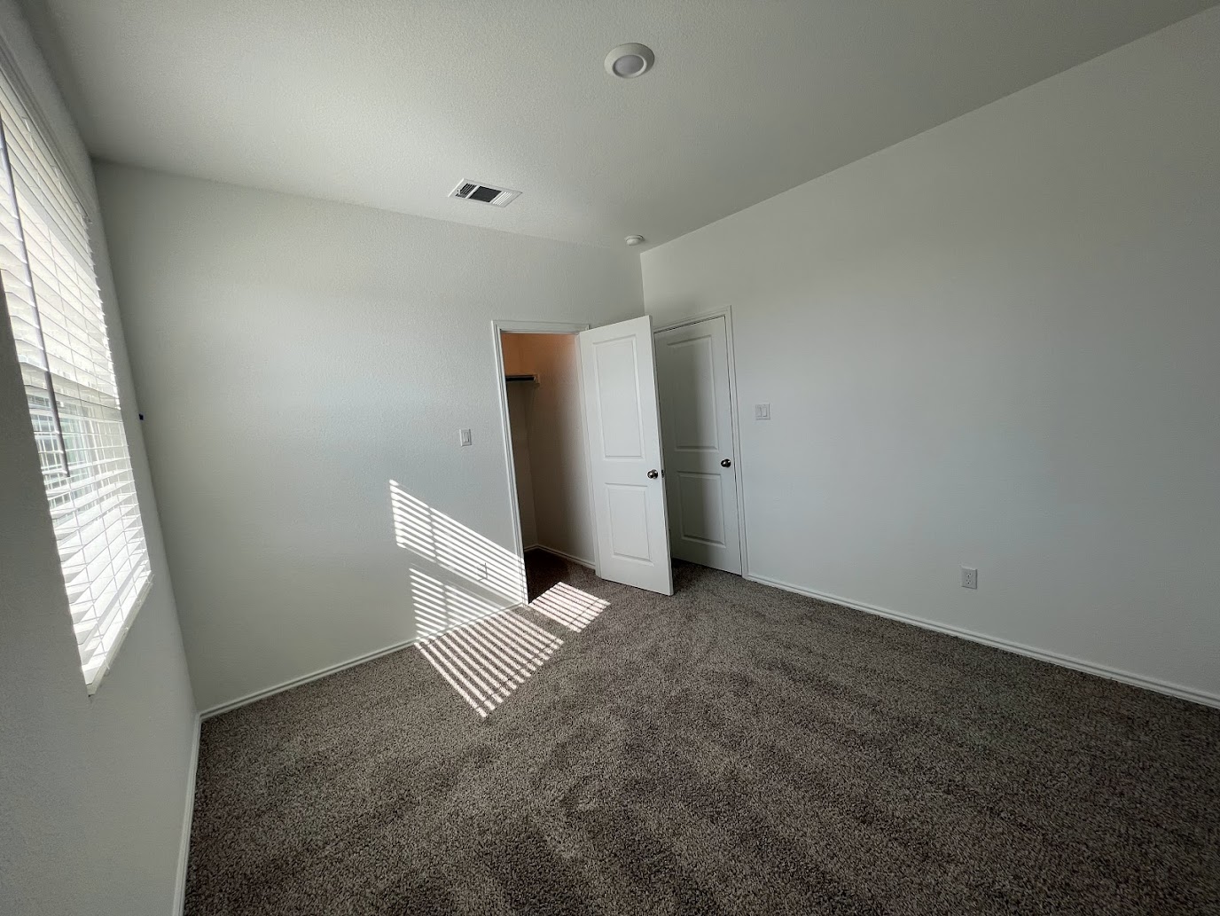 313 Montauk Loop Georgetown, TX 78628 - Photo 9 of 25 an empty room with windows