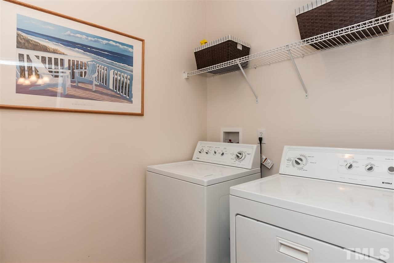 5421 Neuse Forest Road Raleigh, NC 27616 - Photo 11 of 21 a utility room with dryer and washer