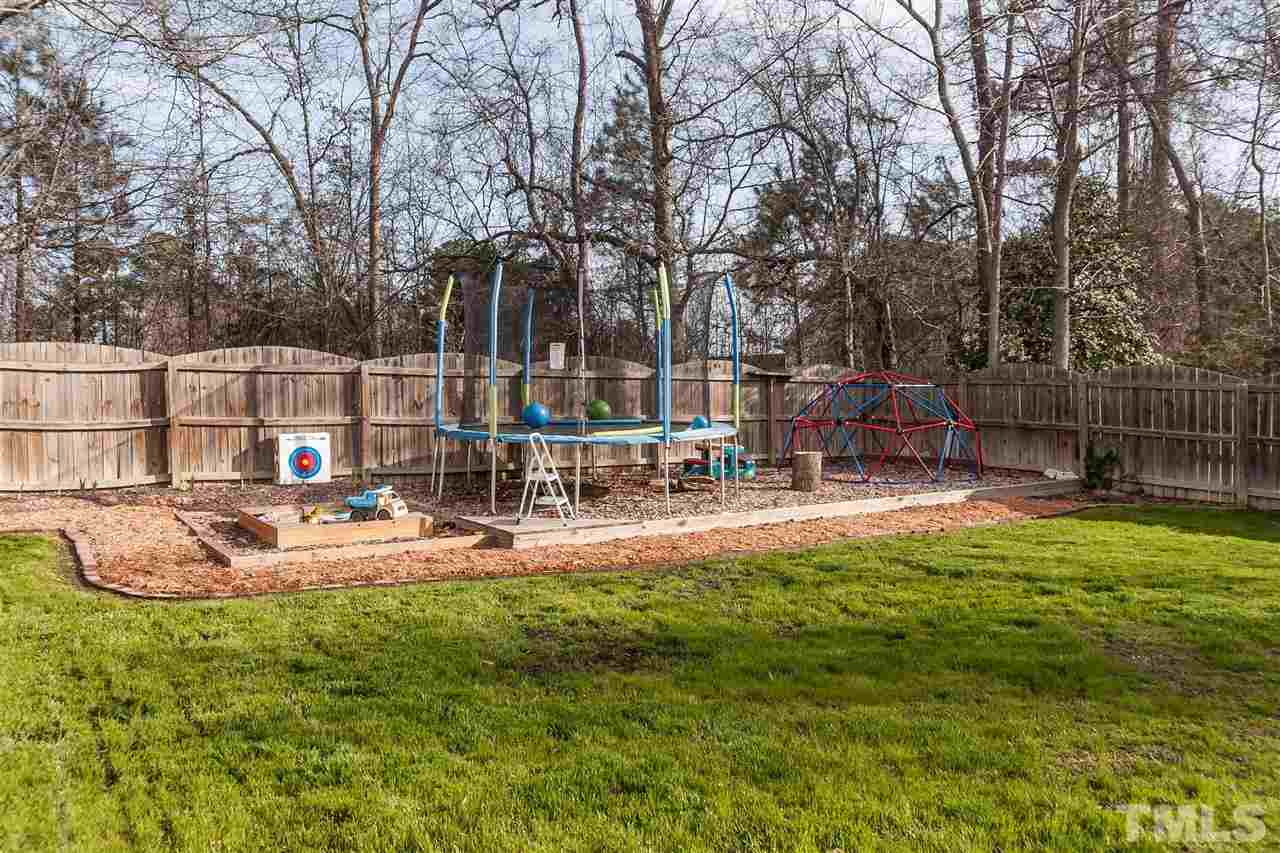 5421 Neuse Forest Road Raleigh, NC 27616 - Photo 19 of 21 a view of a house with backyard and sitting area