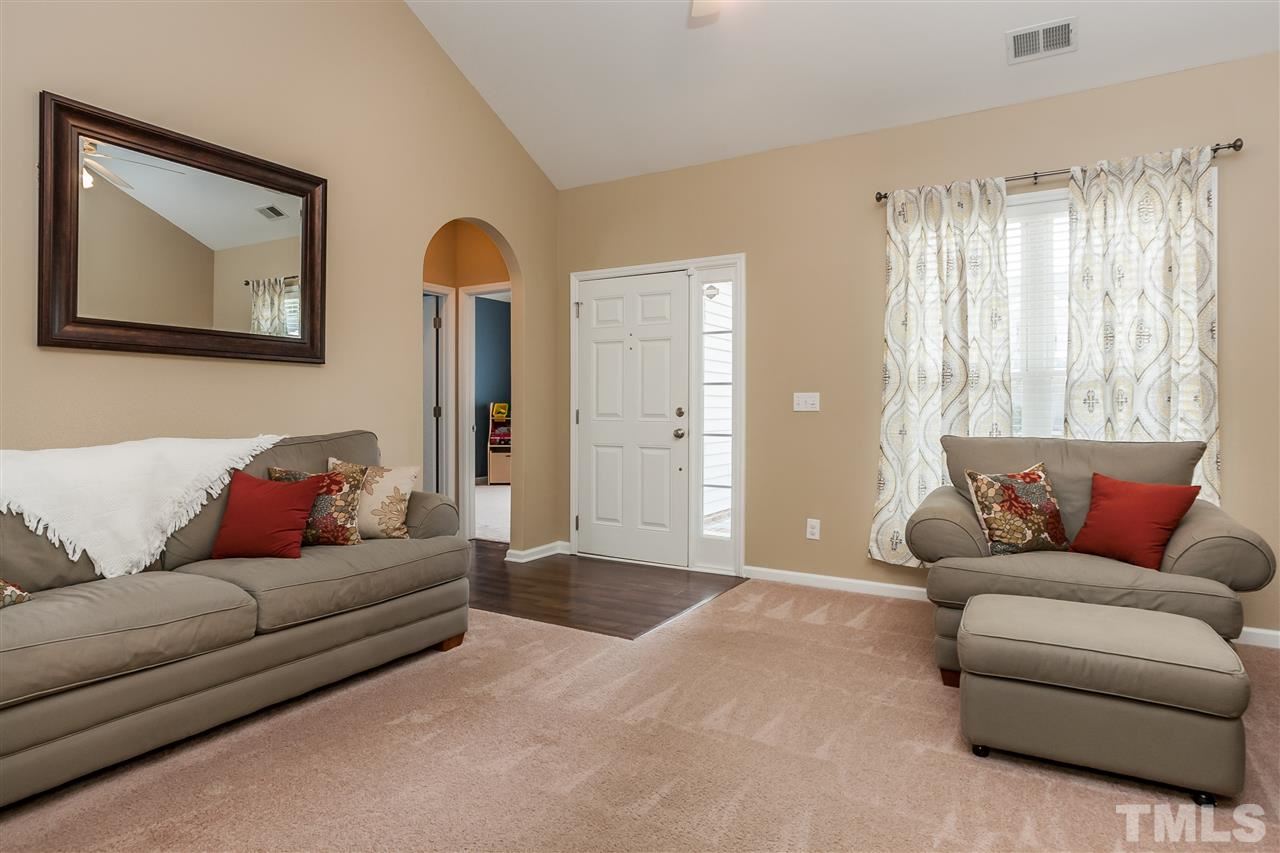 5421 Neuse Forest Road Raleigh, NC 27616 - Photo 6 of 21 a living room with furniture and a window