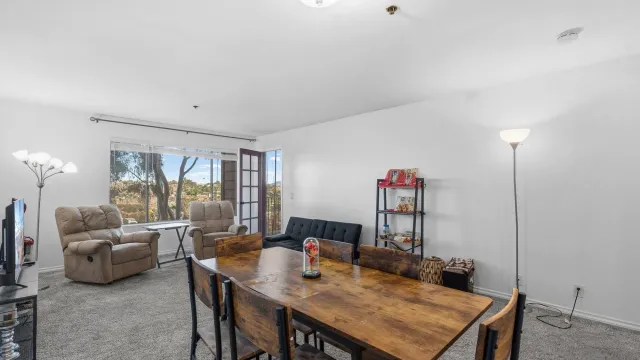 a view of a livingroom with furniture and window