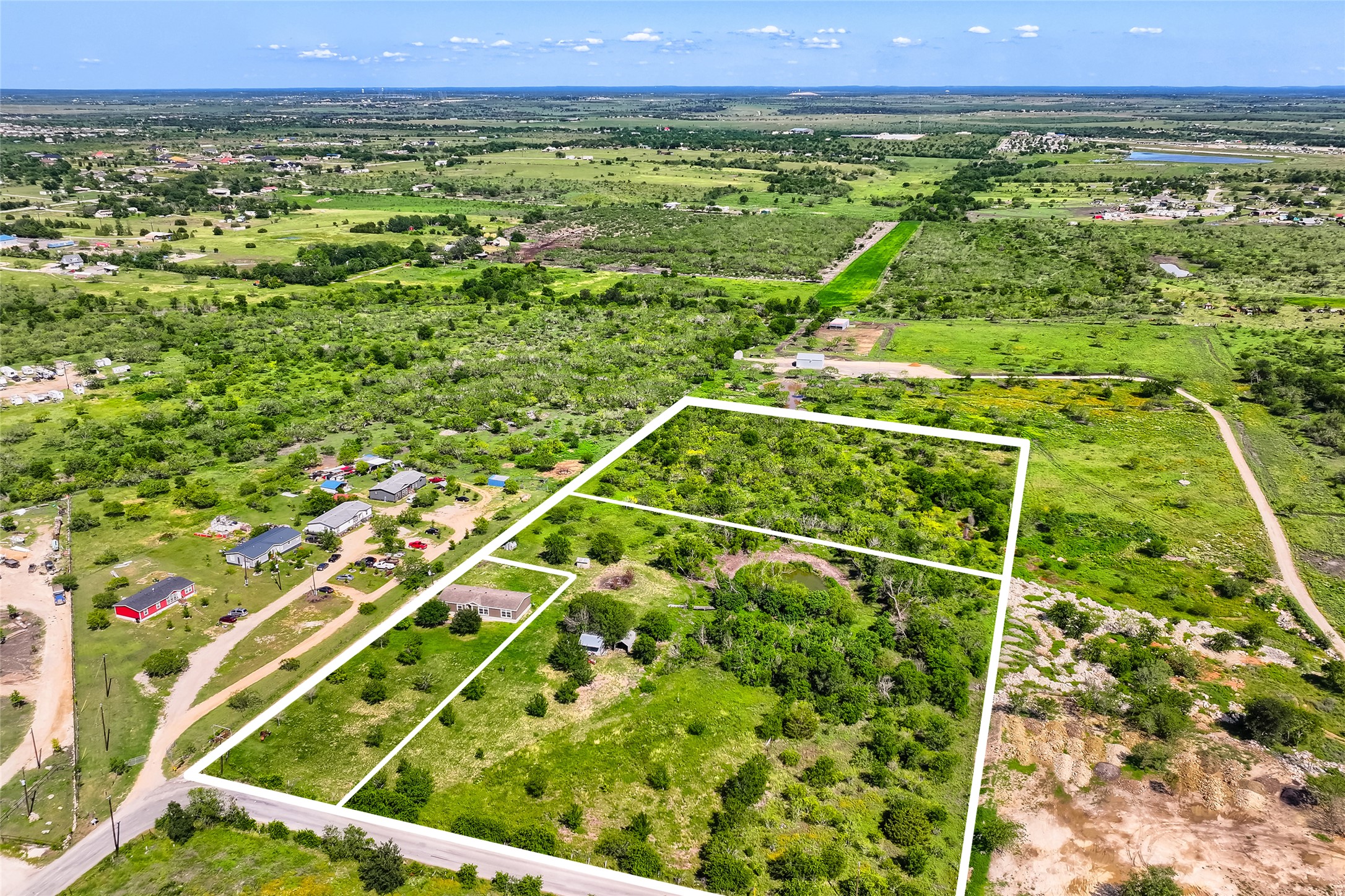 401 Graef Road Kyle, TX 78640 - Photo 29 of 30 Vast green acreage featuring diverse terrain, ripe for development or a private retreat.