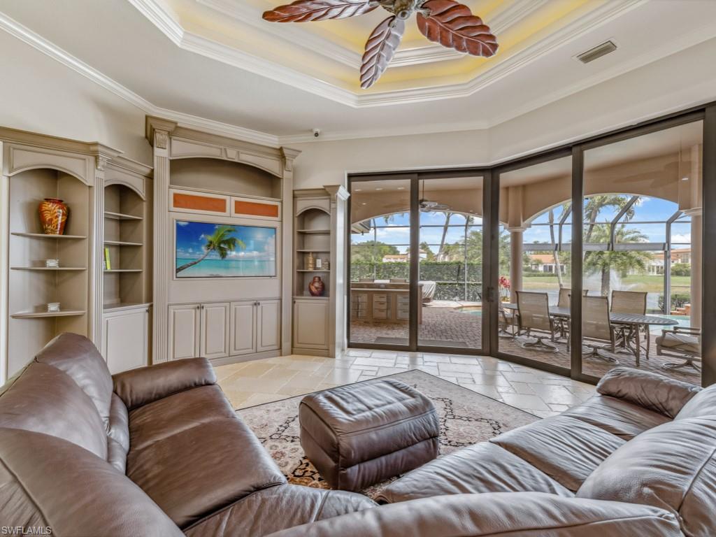 16509 Cellini Lane Naples, FL 34110 - Photo 6 of 49 a living room with furniture and a large window