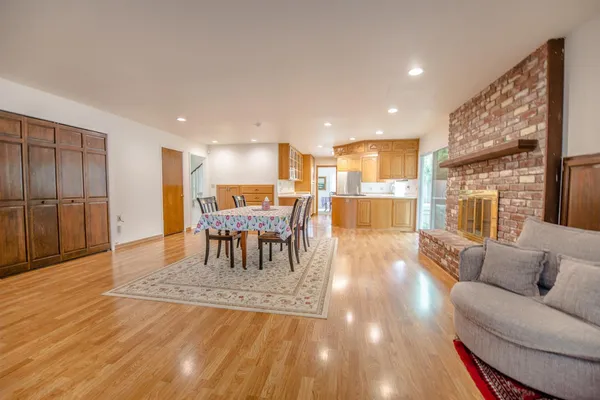 a view of a kitchen with a sink and cabinets