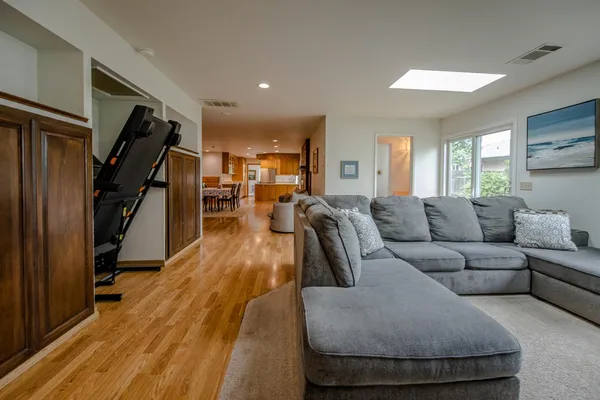 a utility room with cabinets washer and dryer